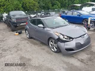 2017 Hyundai Veloster with VIN KMHTC6AD0HU323151, listed as a IAAI auction lot 42661721 with 77,901 mi miles and . Bid and sale history available at DreamBid. Image 1.