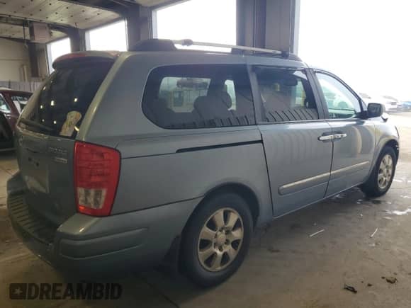 2008 Hyundai Entourage GLS z VIN KNDMC233486054453, wystawiony jako Copart lot #64286305 z przebiegiem 159 649 mil mil oraz Szkoda całkowita • Salvage title. Historia ofert i sprzedaży dostępna na DreamBid. Obrazek 3.