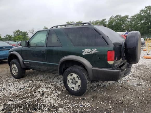 2002 Chevrolet Blazer LS с VIN 1GNCT18W92K128951, выставлен на аукционе Copart как лот 69324585 с пробегом 69 957 миль миль и Чистый • Clean title. История ставок и продаж доступна на DreamBid. Изображение 2.