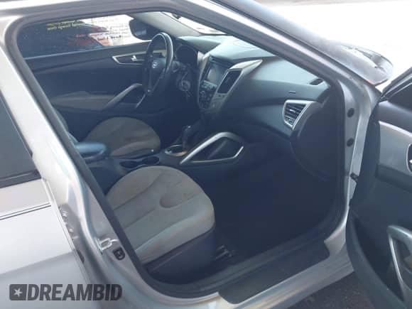 2012 Hyundai Veloster w/Black Int с VIN KMHTC6AD2CU052067, выставлен на аукционе IAAI как лот 42261316 с пробегом 187 234 миль миль и . История ставок и продаж доступна на DreamBid. Изображение 5.