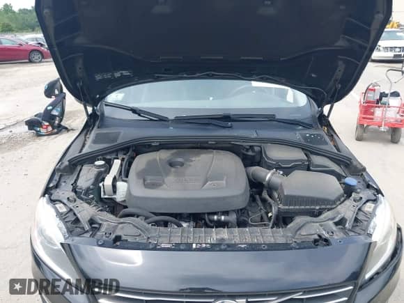2016 Volvo S60 T5 Drive-E Premier z VIN YV126MFKXG2390847, wystawiony jako IAAI lot #42647884 z przebiegiem 115 397 mil mil oraz . Historia ofert i sprzedaży dostępna na DreamBid. Obrazek 10.
