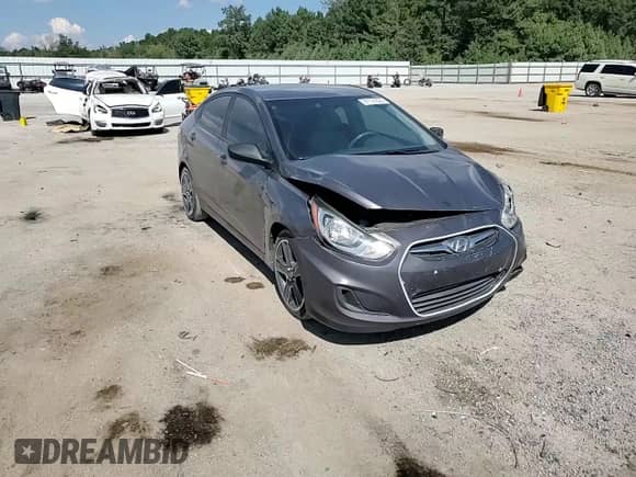 2014 Hyundai Accent GLS z VIN KMHCT4AE8EU704156, wystawiony jako Copart lot #81121835 z przebiegiem 149 131 mil mil oraz Szkoda całkowita • Salvage title. Historia ofert i sprzedaży dostępna na DreamBid. Obrazek 13.