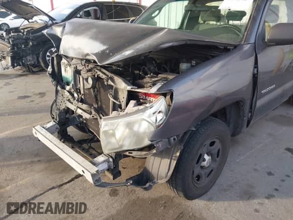 2010 Toyota Tacoma with VIN 5TENX4CN8AZ700057, listed as a IAAI auction lot 41479454 with 209,706 mi miles and . Bid and sale history available at DreamBid. Image 6.