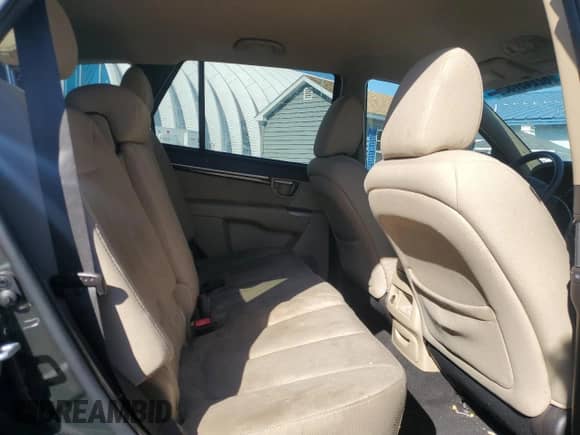 2011 Hyundai Santa Fe GLS z VIN 5XYZGDAB5BG050917, wystawiony jako Copart lot #82243755 z przebiegiem 140 773 mil mil oraz Szkoda całkowita • Salvage title. Historia ofert i sprzedaży dostępna na DreamBid. Obrazek 11.