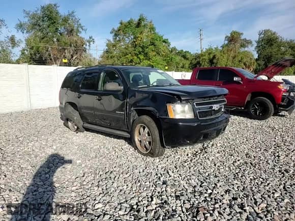 2011 Chevrolet Tahoe LS с VIN 1GNSCAE0XBR223506, выставлен на аукционе Copart как лот 87433045 с пробегом 156 433 миль миль и Списание • Salvage title. История ставок и продаж доступна на DreamBid. Изображение 14.