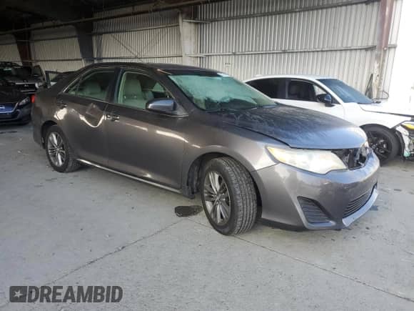 2014 Toyota Camry XLE with VIN 4T4BF1FK7ER394460, listed as a Copart auction lot 82174015 with 142,708 mi miles and Salvage title. Bid and sale history available at DreamBid. Image 4.