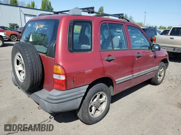 2000 Chevrolet Tracker z VIN 2CNBE13C2Y6939901, wystawiony jako Copart lot #54436335 z przebiegiem 95 234 mil mil oraz Czysty tytuł • Clean title. Historia ofert i sprzedaży dostępna na DreamBid. Obrazek 3.