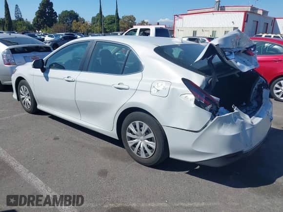 2022 Toyota Camry Hybrid LE with VIN 4T1C31AK1NU036253, listed as a IAAI auction lot 43313594 with 37,078 mi miles and . Bid and sale history available at DreamBid. Image 3.