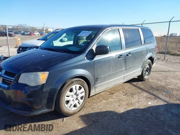 2014 Dodge Grand Caravan American Value with VIN 2C4RDGBGXER451433, listed as a IAAI auction lot 42682156 with 273,976 mi miles and . Bid and sale history available at DreamBid. Image 2.