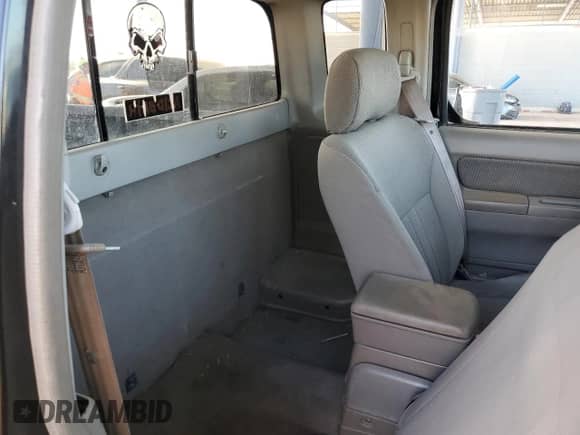 2002 Nissan Frontier XE with VIN 1N6ED26T12C389432, listed as a Copart auction lot 86556214 with 245,397 mi miles and Salvage title. Bid and sale history available at DreamBid. Image 10.