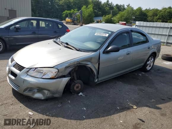 2004 Dodge Stratus SXT with VIN 1B3EL46X64N320877, listed as a Copart auction lot 62093375 with 76,818 mi miles and Salvage title. Bid and sale history available at DreamBid. Image 1.