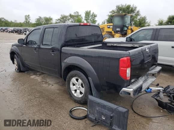2010 Nissan Frontier Pro-4X with VIN 1N6AD0EV3AC415842, listed as a Copart auction lot 66193675 with 189,895 mi miles and Salvage title. Bid and sale history available at DreamBid. Image 2.