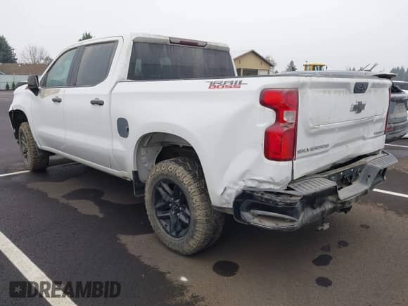 2022 Chevrolet Silverado 1500 Custom Trail Boss with VIN 3GCPYCEK3NG147175, listed as a IAAI auction lot 38760584 with 9,256 mi miles and . Bid and sale history available at DreamBid. Image 3.