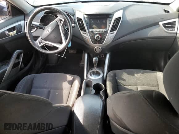 2013 Hyundai Veloster w/Black Int z VIN KMHTC6AD9DU095127, wystawiony jako Copart lot #70422785 z przebiegiem 188 309 mil mil oraz Szkoda całkowita • Salvage title. Historia ofert i sprzedaży dostępna na DreamBid. Obrazek 8.