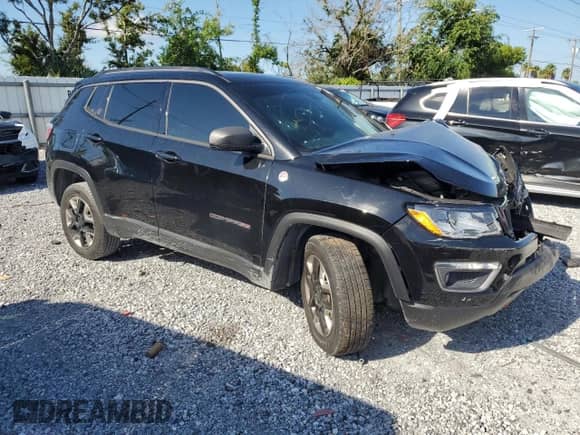 2017 Jeep Compass Trailhawk with VIN 3C4NJDDBXHT607219, listed as a Copart auction lot 69511815 with Not provided miles and Salvage title. Bid and sale history available at DreamBid. Image 4.