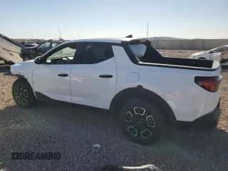 2022 Hyundai Santa Cruz SEL с VIN 5NTJBDAE4NH024104, выставлен на аукционе Copart как лот 71606484 с пробегом 27 900 миль миль и Списание • Salvage title. История ставок и продаж доступна на DreamBid. Изображение 2.