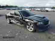 2007 Dodge Charger SRT-8 с VIN 2B3KA73WX7H790199, выставлен на аукционе Copart как лот 55916245 с пробегом 84 965 миль миль и Списание • Salvage title. История ставок и продаж доступна на DreamBid. Изображение 4.