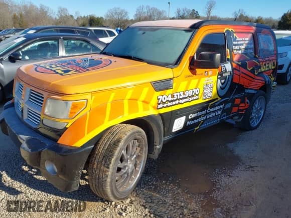 2011 Dodge Nitro SXT z VIN 1D4PU5GK9BW535743, wystawiony jako IAAI lot #41200573 z przebiegiem 155 239 mil mil oraz . Historia ofert i sprzedaży dostępna na DreamBid. Obrazek 2.