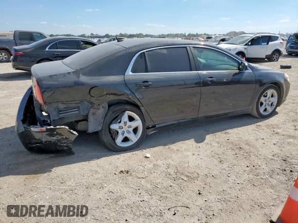 2011 Chevrolet Malibu 1LS z VIN 1G1ZB5E18BF152438, wystawiony jako Copart lot #86481555 z przebiegiem Nie podano mil oraz Szkoda całkowita • Salvage title. Historia ofert i sprzedaży dostępna na DreamBid. Obrazek 3.