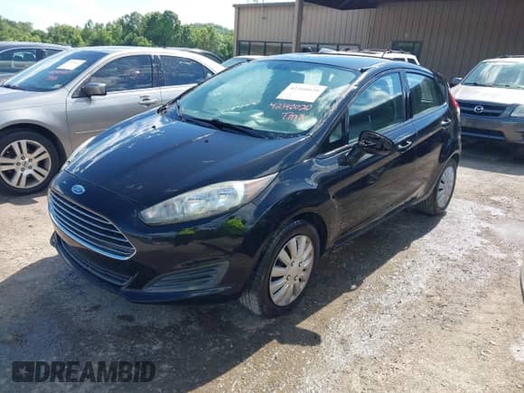 2014 Ford Fiesta S with VIN 3FADP4TJ6EM241516, listed as a IAAI auction lot 42340020 with 189,848 mi miles and . Bid and sale history available at DreamBid. Image 2.