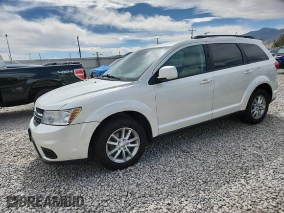 2015 Dodge Journey SXT with VIN 3C4PDDBG1FT593741, listed as a Copart auction lot 71986735 with 182,841 mi miles and Clean title. Bid and sale history available at DreamBid. Image 1.