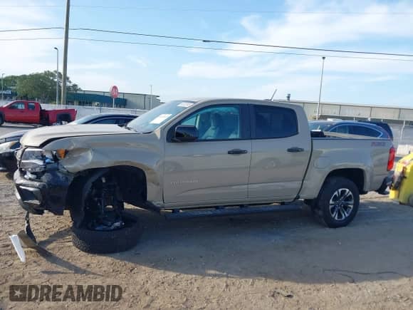 2022 Chevrolet Colorado 2WD Z71 z VIN 1GCGSDEN9N1332637, wystawiony jako IAAI lot #42109595 z przebiegiem 2 740 mil mil oraz . Historia ofert i sprzedaży dostępna na DreamBid. Obrazek 14.