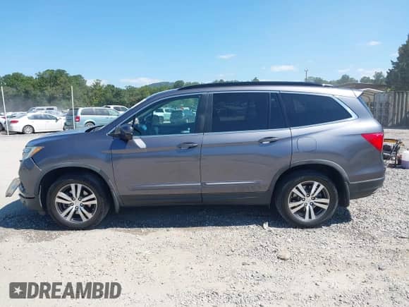 2018 Honda Pilot EX-L with VIN 5FNYF5H50JB006656, listed as a IAAI auction lot 43179982 with 130,515 mi miles and . Bid and sale history available at DreamBid. Image 14.