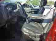 2004 Dodge 1500 SLT z VIN 1D7HU18NX4J261459, wystawiony jako Copart lot #66524055 z przebiegiem 150 963 mil mil oraz Szkoda całkowita • Salvage title. Historia ofert i sprzedaży dostępna na DreamBid. Obrazek 7.