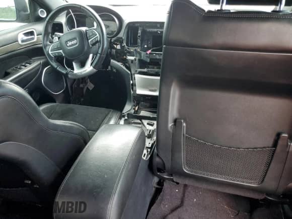 2021 Jeep Grand Cherokee Trackhawk z VIN 1C4RJFN96MC840612, wystawiony jako Copart lot #84267685 z przebiegiem Nie podano mil oraz Szkoda całkowita • Salvage title. Historia ofert i sprzedaży dostępna na DreamBid. Obrazek 8.