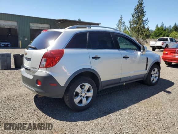 2014 Chevrolet Captiva Sport LS z VIN 3GNAL1EK6ES542321, wystawiony jako Copart lot #58269635 z przebiegiem 126 853 mil mil oraz Szkoda całkowita • Salvage title. Historia ofert i sprzedaży dostępna na DreamBid. Obrazek 3.