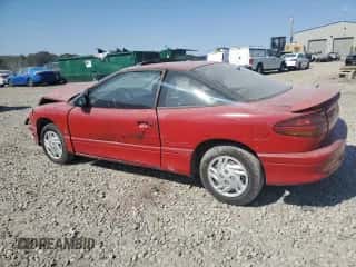 1996 Saturn SC with VIN 1G8ZF1281TZ216240, listed as a Copart auction lot 74964504 with 201,977 mi miles and Salvage title. Bid and sale history available at DreamBid. Image 2.