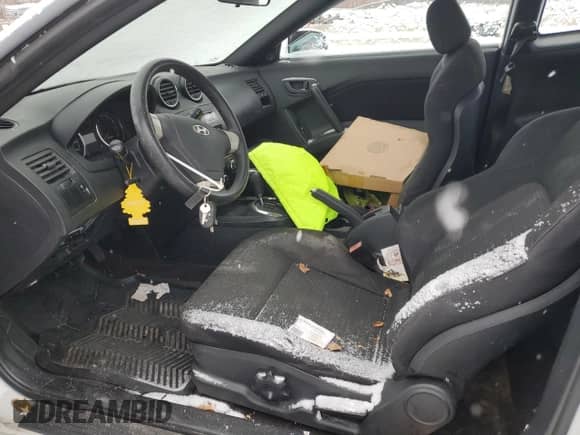 2007 Hyundai Tiburon GS с VIN KMHHM66D67U254976, выставлен на аукционе Copart как лот 87434194 с пробегом Не указан миль и Чистый • Clean title. История ставок и продаж доступна на DreamBid. Изображение 7.