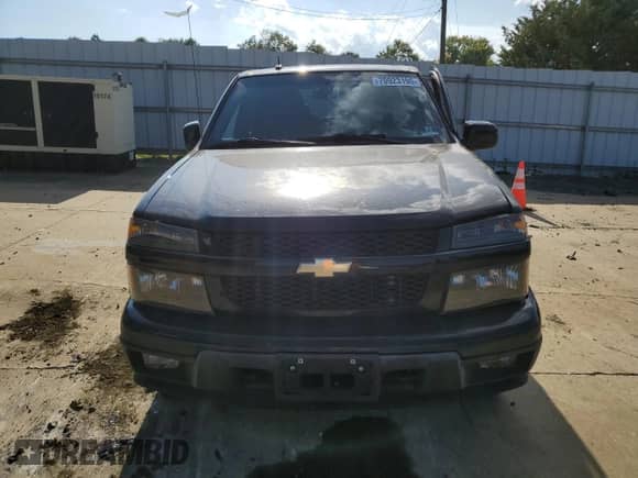 2012 Chevrolet Colorado 1LT z VIN 1GCHTCFE5C8167717, wystawiony jako Copart lot #70923195 z przebiegiem 161 738 mil mil oraz Szkoda całkowita • Salvage title. Historia ofert i sprzedaży dostępna na DreamBid. Obrazek 5.