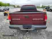 2003 Dodge Dakota с VIN 1D7HL12X83S183673, выставлен на аукционе Copart как лот 58044055 с пробегом 148 162 миль миль и Списание • Salvage title. История ставок и продаж доступна на DreamBid. Изображение 6.