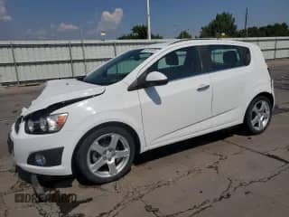 2014 Chevrolet Sonic LTZ with VIN 1G1JE6SB4E4129147, listed as a Copart auction lot 66730325 with 137,868 mi miles and Salvage title. Bid and sale history available at DreamBid. Image 1.