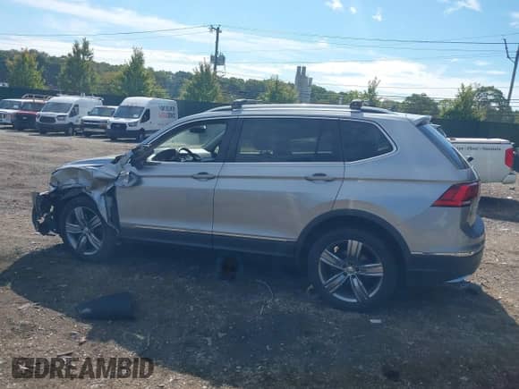 2020 Volkswagen Tiguan SE с VIN 3VV2B7AXXLM096634, выставлен на аукционе IAAI как лот 43312076 с пробегом 61 294 миль миль и . История ставок и продаж доступна на DreamBid. Изображение 14.