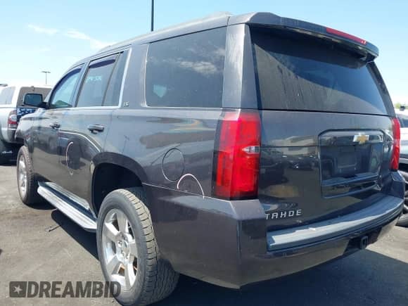 2015 Chevrolet Tahoe LS z VIN 1GNSCAKC0FR742276, wystawiony jako IAAI lot #43052060 z przebiegiem 58 077 mil mil oraz . Historia ofert i sprzedaży dostępna na DreamBid. Obrazek 3.