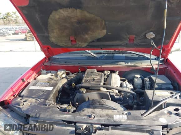 2002 Chevrolet TrailBlazer LTZ z VIN 1GNDT13S422163650, wystawiony jako IAAI lot #42063356 z przebiegiem Nie podano mil oraz . Historia ofert i sprzedaży dostępna na DreamBid. Obrazek 10.