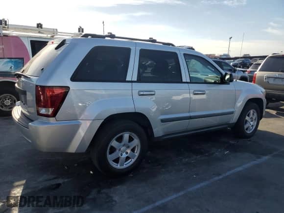 2009 Jeep Grand Cherokee Laredo with VIN 1J8GS48K79C528175, listed as a Copart auction lot 69396065 with 97,409 mi miles and Clean title. Bid and sale history available at DreamBid. Image 3.