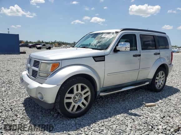 2011 Dodge Nitro Heat with VIN 1D4PT4GK5BW605204, listed as a Copart auction lot 52677235 with 104,039 mi miles and Salvage title. Bid and sale history available at DreamBid. Image 1.