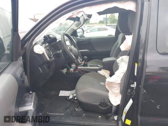 2018 Toyota Tacoma SR with VIN 5TFRX5GN1JX122683, listed as a IAAI auction lot 43283447 with 89,252 mi miles and . Bid and sale history available at DreamBid. Image 5.