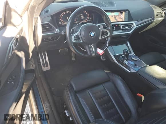 2021 BMW 4 Series 430i z VIN WBA53AP06MCF81825, wystawiony jako Copart lot #86771655 z przebiegiem 74 692 mil mil oraz Szkoda całkowita • Salvage title. Historia ofert i sprzedaży dostępna na DreamBid. Obrazek 8.