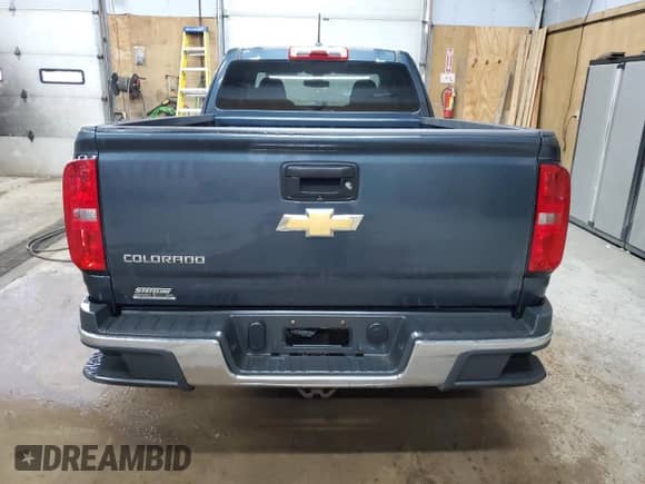 2019 Chevrolet Colorado 4WD Work Truck с VIN 1GCHTBEA5K1109946, выставлен на аукционе Copart как лот 70477245 с пробегом 101 569 миль миль и Чистый • Clean title. История ставок и продаж доступна на DreamBid. Изображение 6.