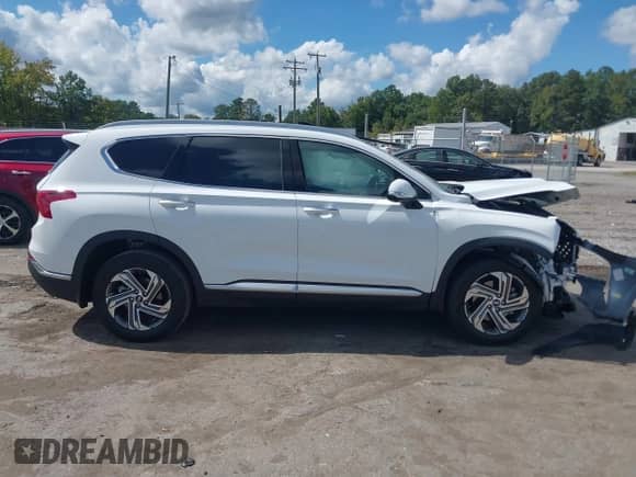 2023 Hyundai Santa Fe SEL with VIN 5NMS34AJ0PH636636, listed as a IAAI auction lot 43206173 with 16,736 mi miles and . Bid and sale history available at DreamBid. Image 13.
