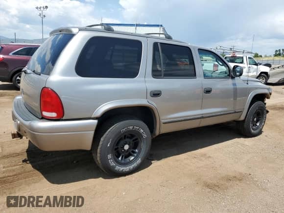 2000 Dodge Durango with VIN 1B4HS28Z0YF131530, listed as a Copart auction lot 63872285 with 188,907 mi miles and Salvage title. Bid and sale history available at DreamBid. Image 3.