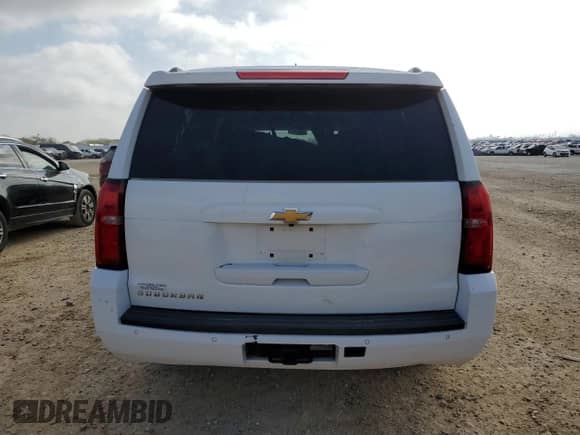 2017 Chevrolet Suburban Commercial with VIN 1GNSKKEC2HR358698, listed as a Copart auction lot 49236005 with 186,171 mi miles and Salvage title. Bid and sale history available at DreamBid. Image 6.