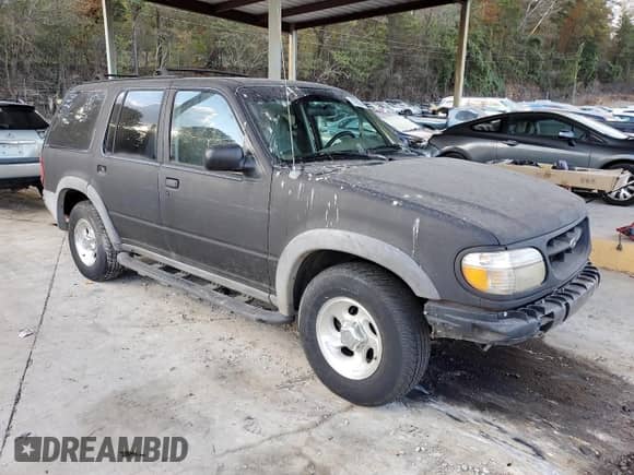 1999 Ford Explorer XL с VIN 1FMDU32X2XZA30166, выставлен на аукционе Copart как лот 77955094 с пробегом 212 805 миль миль и Списание • Salvage title. История ставок и продаж доступна на DreamBid. Изображение 4.