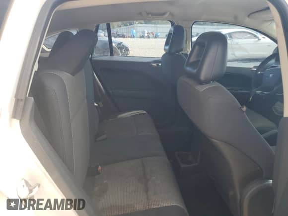 2009 Dodge Caliber SXT with VIN 1B3HB48A89D224125, listed as a Copart auction lot 61968005 with 241,959 mi miles and Salvage title. Bid and sale history available at DreamBid. Image 10.