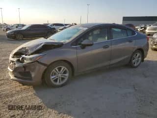 2018 Chevrolet Cruze LT с VIN 1G1BE5SM8J7156764, выставлен на аукционе Copart как лот 71676335 с пробегом 134 999 миль миль и Списание • Salvage title. История ставок и продаж доступна на DreamBid. Изображение 1.