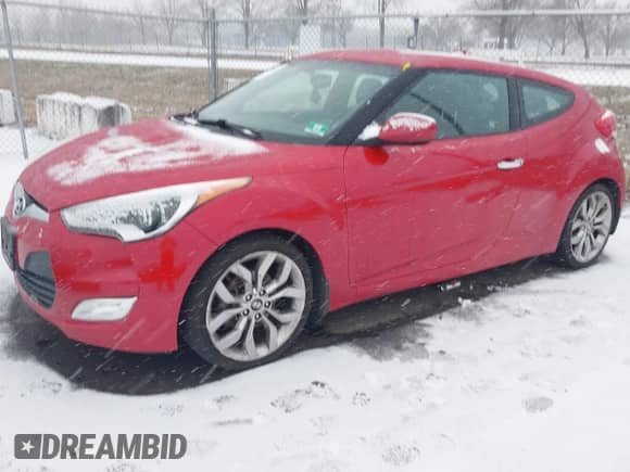 2014 Hyundai Veloster z VIN KMHTC6AD8EU214612, wystawiony jako IAAI lot #41258820 z przebiegiem 61 984 mil mil oraz . Historia ofert i sprzedaży dostępna na DreamBid. Obrazek 17.